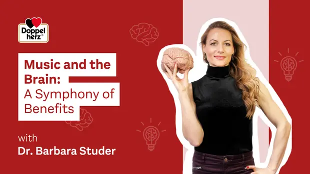 A woman holds a model of a brain while wearing a black top, symbolizing the connection between music and cognitive benefits. Text overlays state "Music and the Brain: A Symphony of Benefits" and features the name Dr. Barbara Studer, indicating her expertise on the subject.
